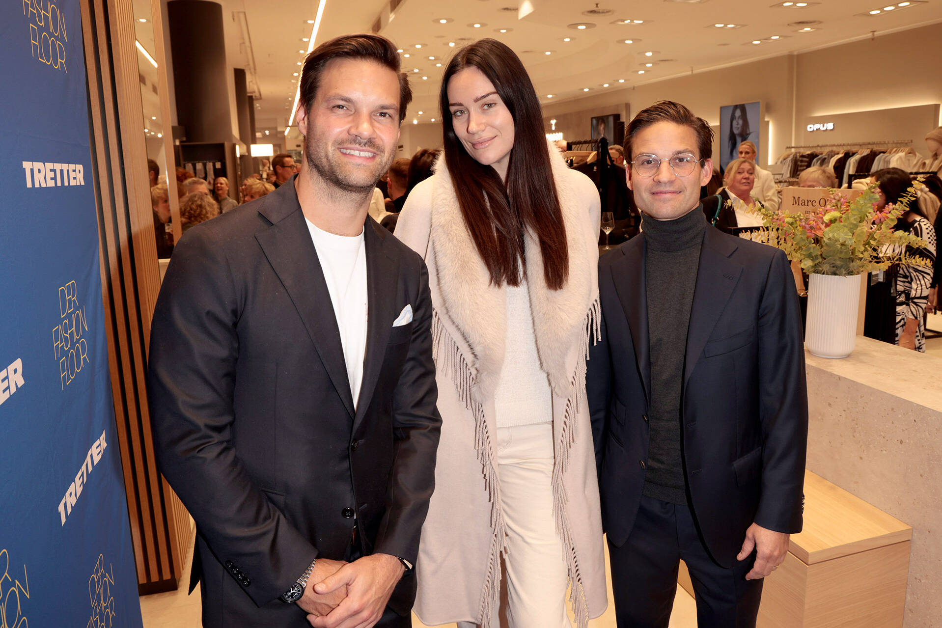 Luca Tretter, Gloria-Sophie Burkandt, Gregor Tretter TRETTER Style in Motion Night und Opening des Fashion Floor im Tretter Stammhaus in München am 22.10.2026 Agency People Image (c) Andy Knoth