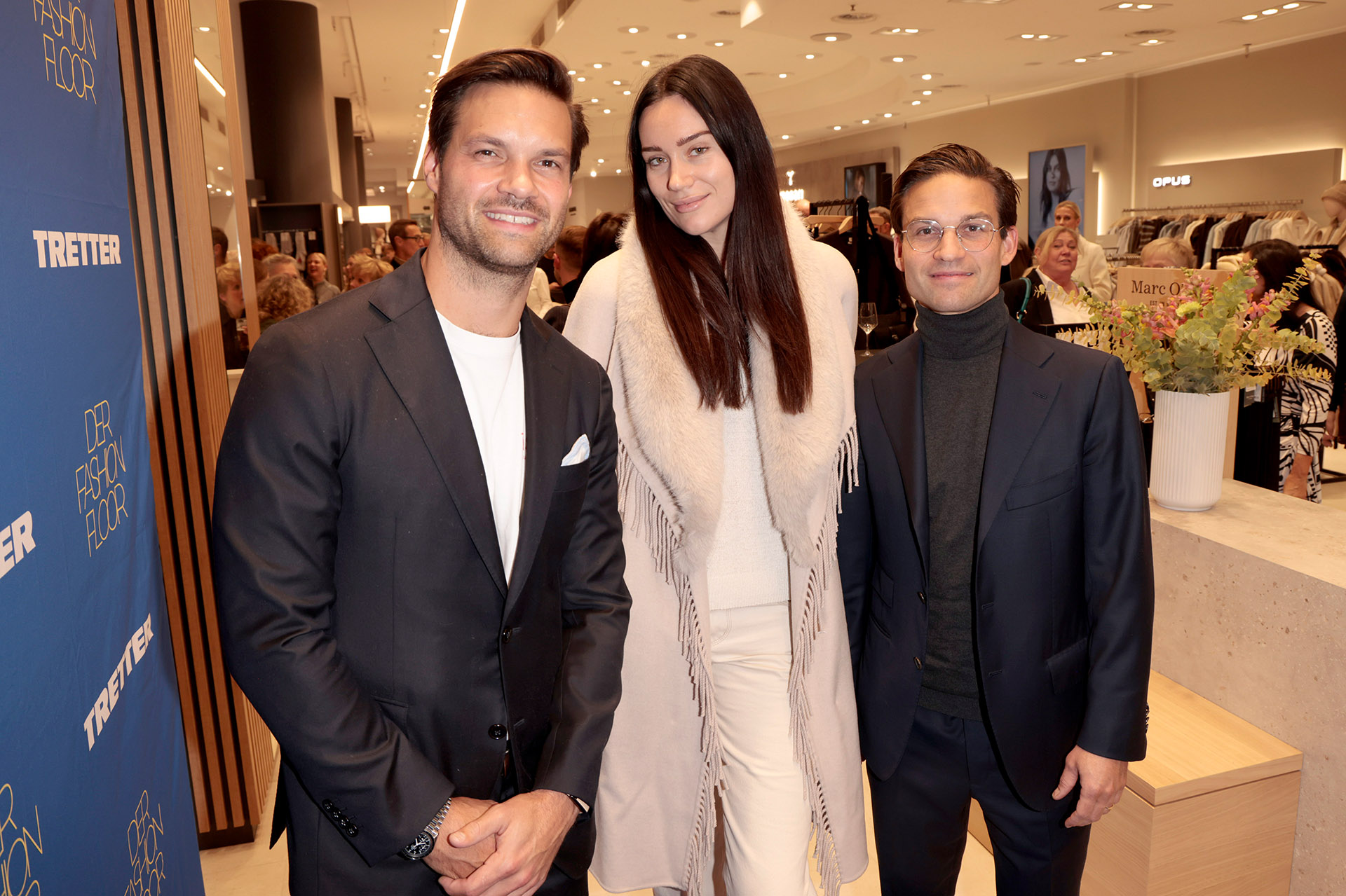 Luca Tretter, Gloria-Sophie Burkandt, Gregor Tretter TRETTER Style in Motion Night und Opening des Fashion Floor im Tretter Stammhaus in München am 22.10.2026 Agency People Image (c) Andy Knoth